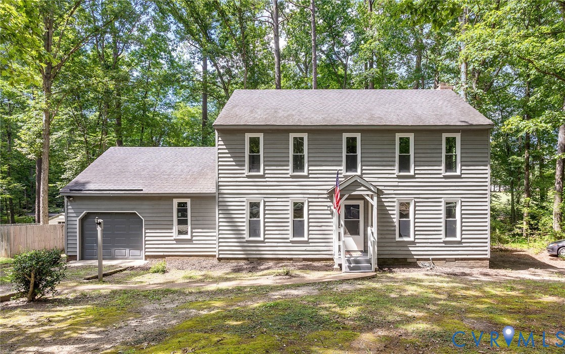 3121 Quail Hill Drive Midlothian, VA 23112 - Photo 1 of 37 a front view of a house with a garden