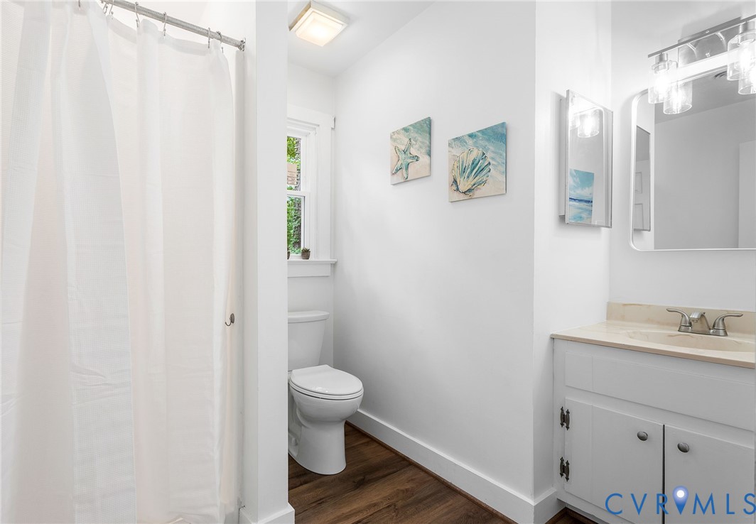 3121 Quail Hill Drive Midlothian, VA 23112 - Photo 21 of 37 a bathroom with a sink toilet and vanity