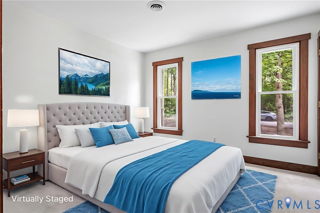 3121 Quail Hill Drive Midlothian, VA 23112 - Photo 22 of 37 a bedroom with a bed and a painting on the wall