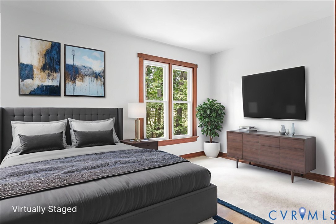 3121 Quail Hill Drive Midlothian, VA 23112 - Photo 24 of 37 a living room with furniture and a flat screen tv