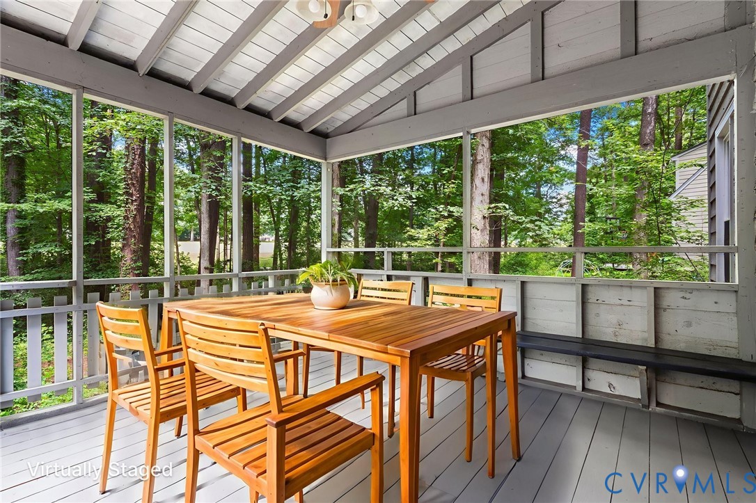 3121 Quail Hill Drive Midlothian, VA 23112 - Photo 29 of 37 a view of a patio with a table chairs and wooden floor