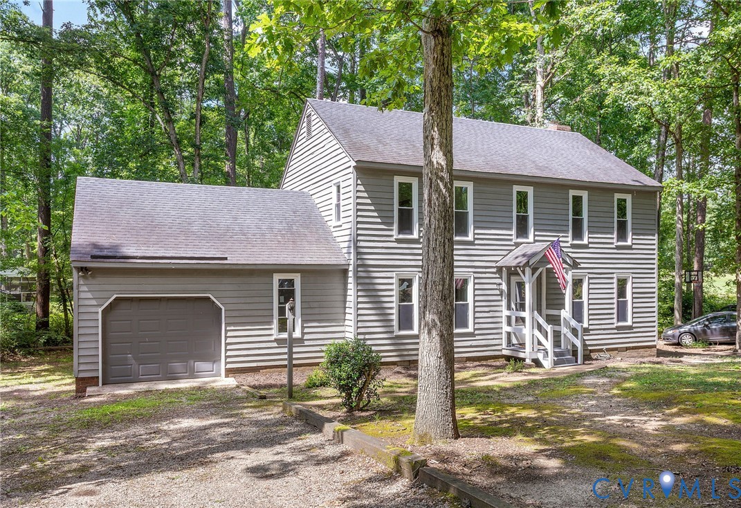3121 Quail Hill Drive Midlothian, VA 23112 - Photo 34 of 37 a front view of a house with a garage