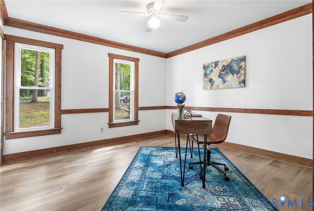 3121 Quail Hill Drive Midlothian, VA 23112 - Photo 4 of 37 a view of a dining room with furniture window and wooden floor