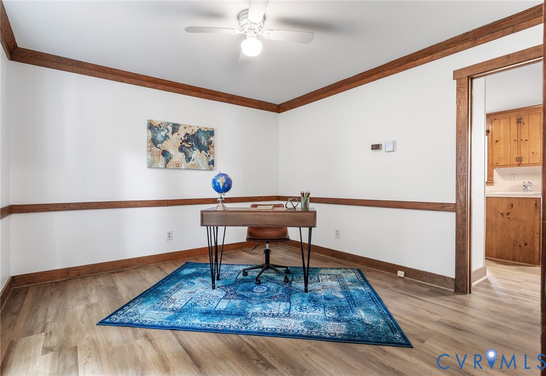 3121 Quail Hill Drive Midlothian, VA 23112 - Photo 5 of 37 a view of a workspace room with wooden floor and furniture