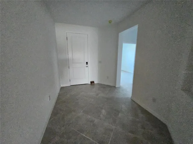 a bathroom with a sink a toilet a mirror a bathtub and shower