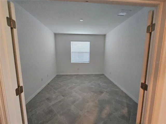 an empty room with a window