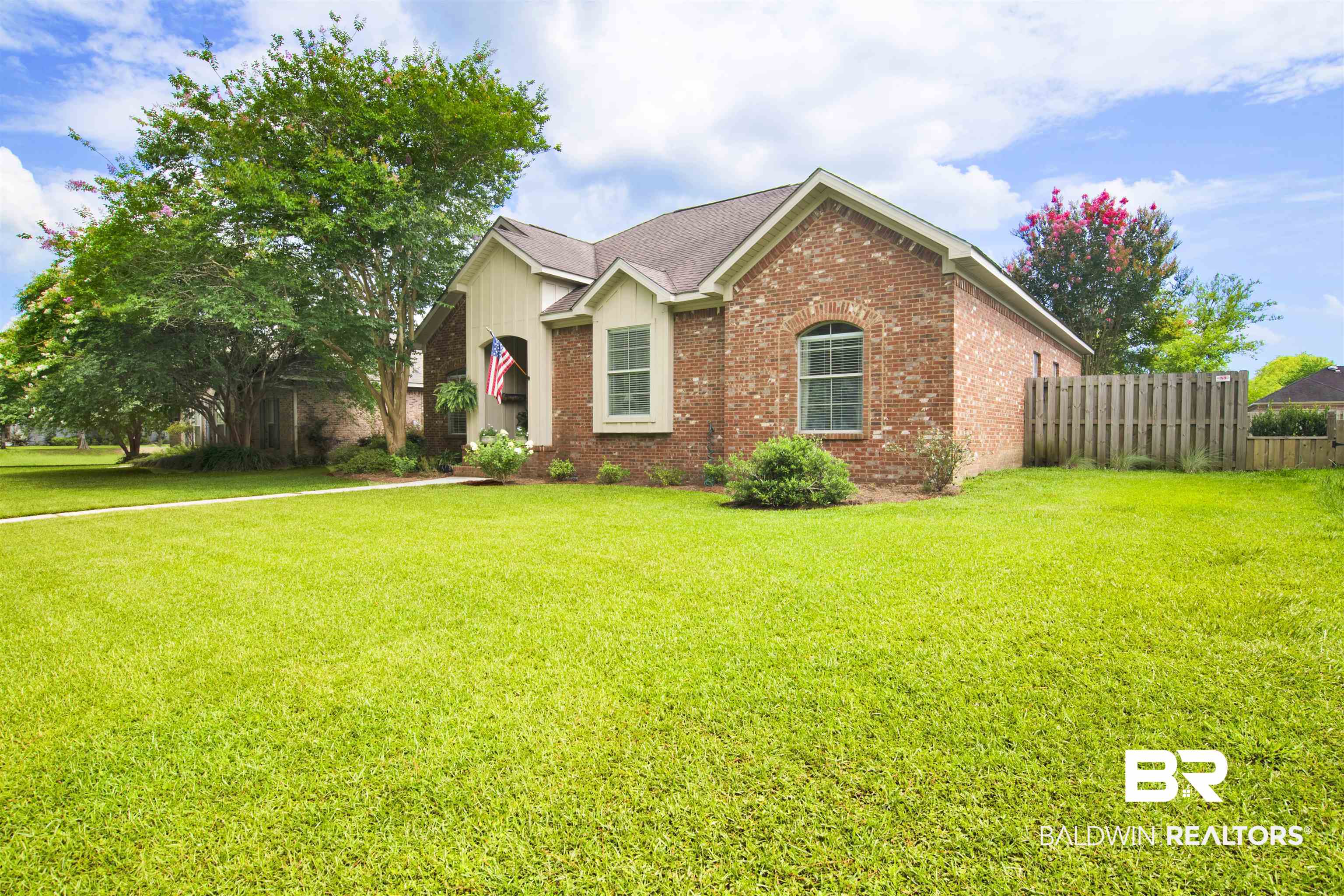 10368 Gayfer Rd Extension Fairhope, AL 36532 - Photo 42 of 43 Brick exterior with gabled roofline and architectural window accents