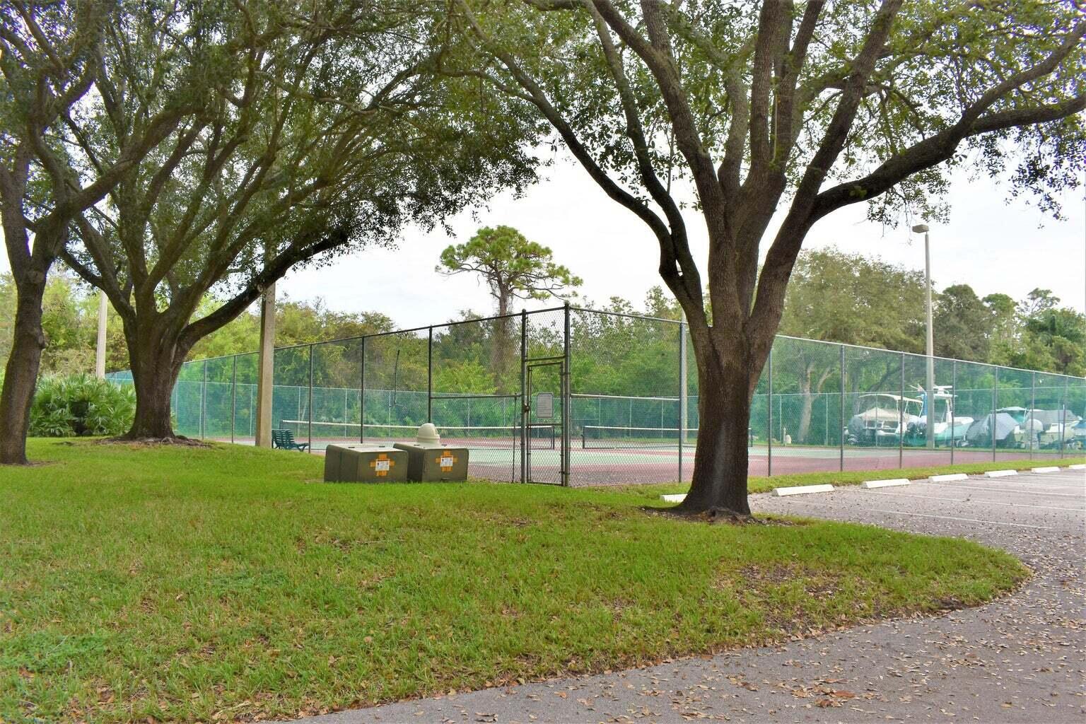 2502 Southeast Anchorage Cove, Unit 3 Port St. Lucie, FL 34952 - Photo 7 of 15 a view of a park with tree s