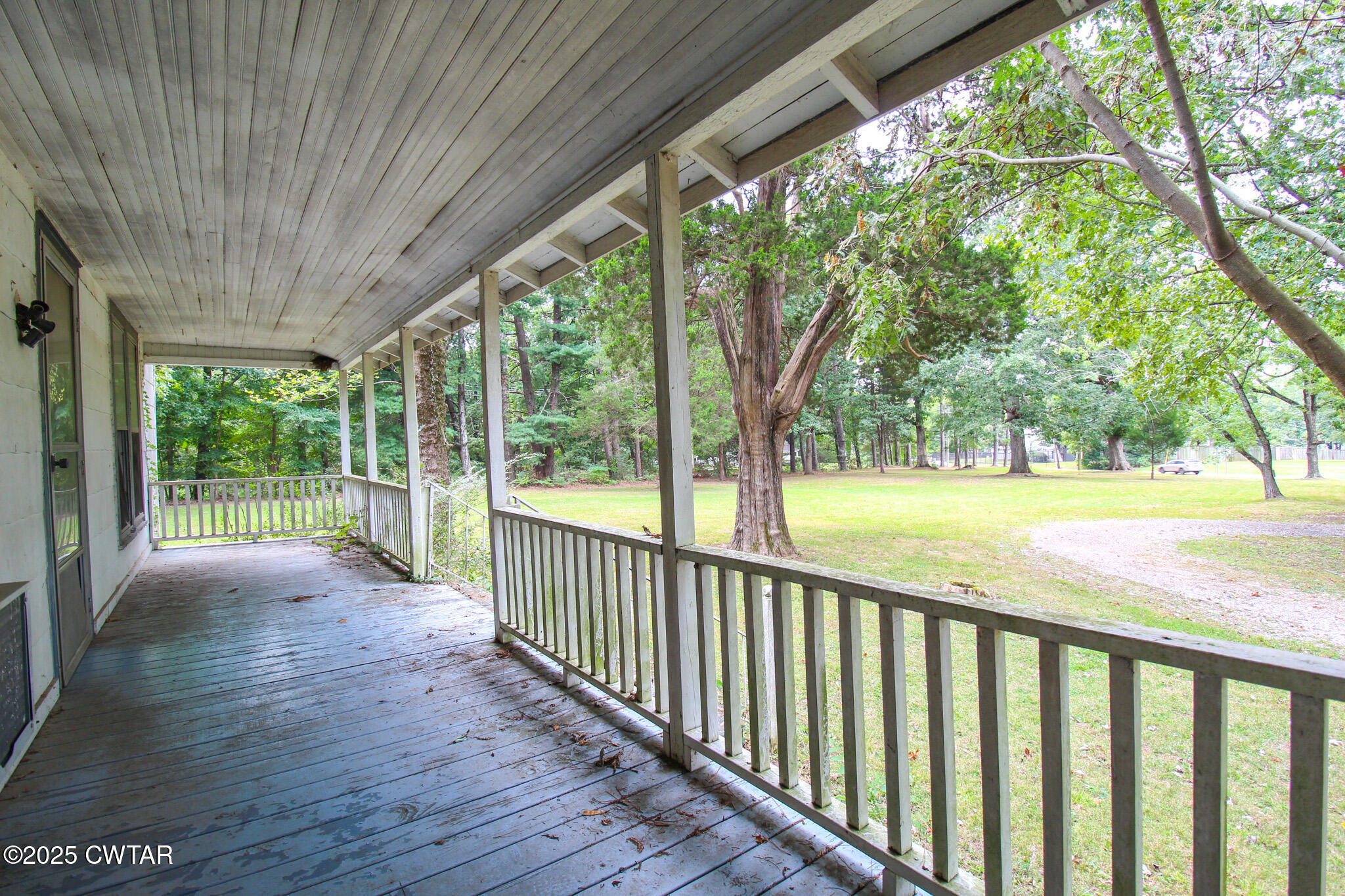 1352 Whitehall Street Jackson, TN 38301 - Photo 3 of 34 a view of outdoor space with deck and wooden fence
