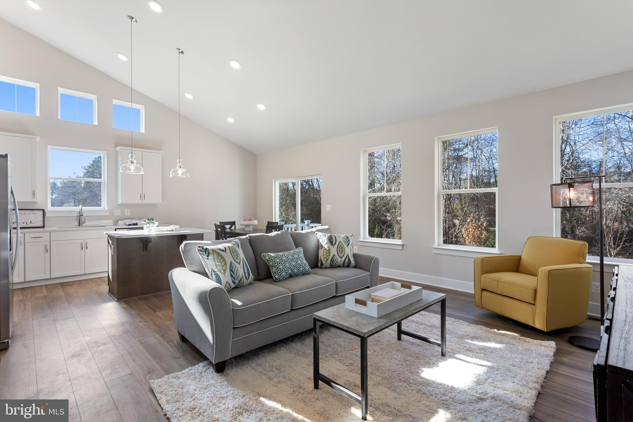 Tbb Wetherby Circle, Unit ALOHA Millsboro, DE 19966 - Photo 4 of 21 a living room with furniture and a large window