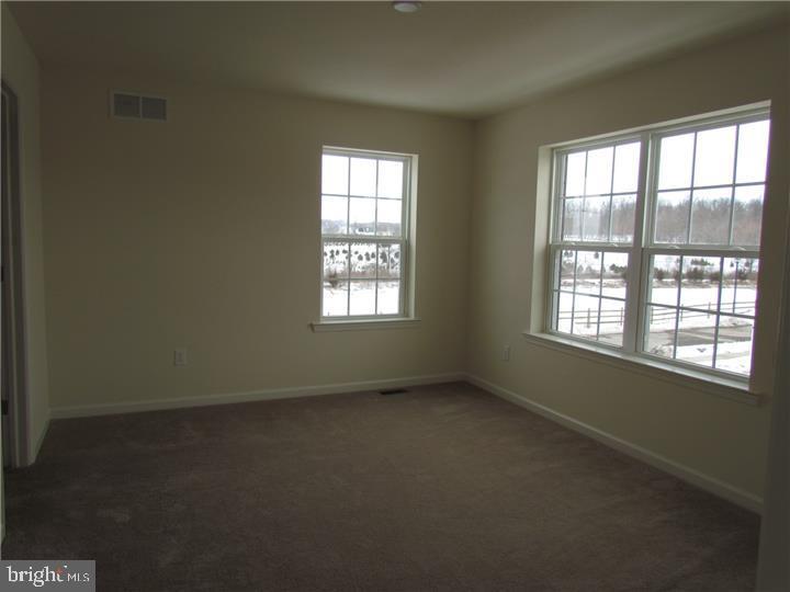 3889 Cephas Child Road, Unit 13 Doylestown, PA 18902 - Photo 16 of 25 an empty room with a window