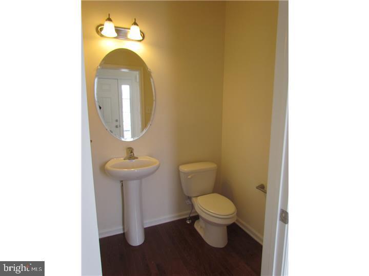 3889 Cephas Child Road, Unit 13 Doylestown, PA 18902 - Photo 22 of 25 a bathroom with a toilet and a sink