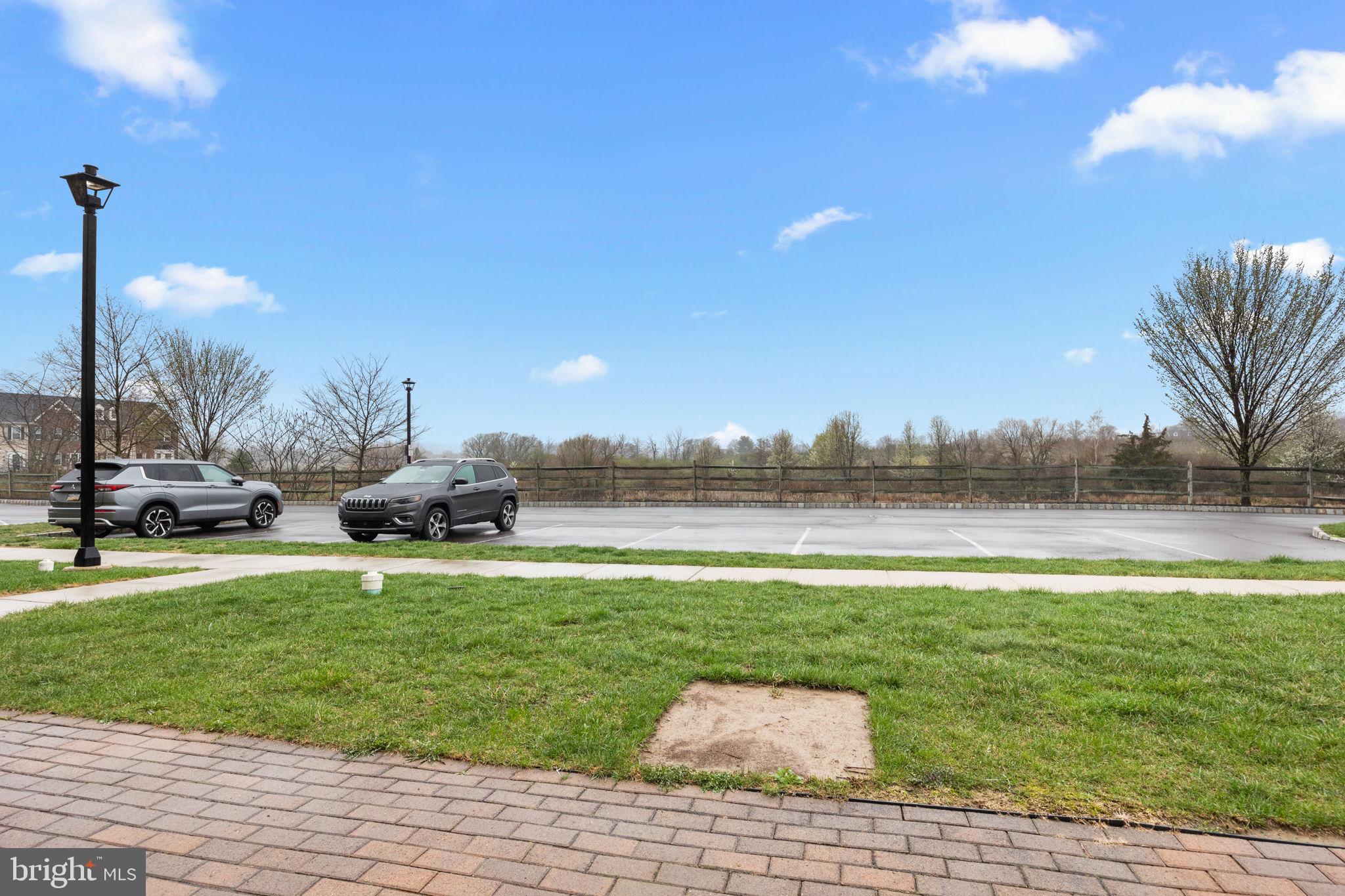 3889 Cephas Child Road, Unit 13 Doylestown, PA 18902 - Photo 24 of 25 a view of a water fountain and a big yard
