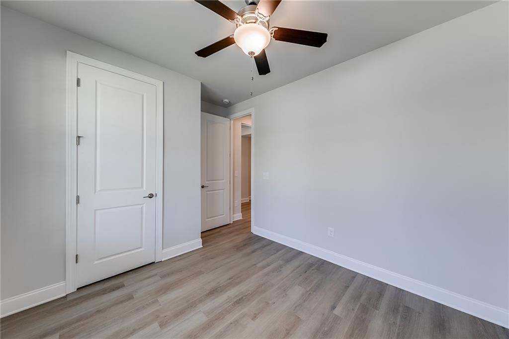 118 Classic Overlook Homer, GA 30547 - Photo 24 of 42 a view of an empty room and window a ceiling fan