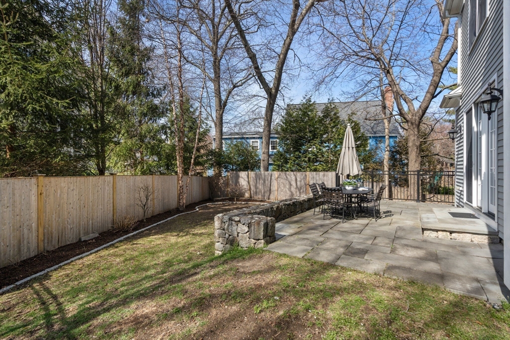 22 Oakencroft Road Wellesley, MA 02482 - Photo 40 of 40 a view of a backyard with a tree