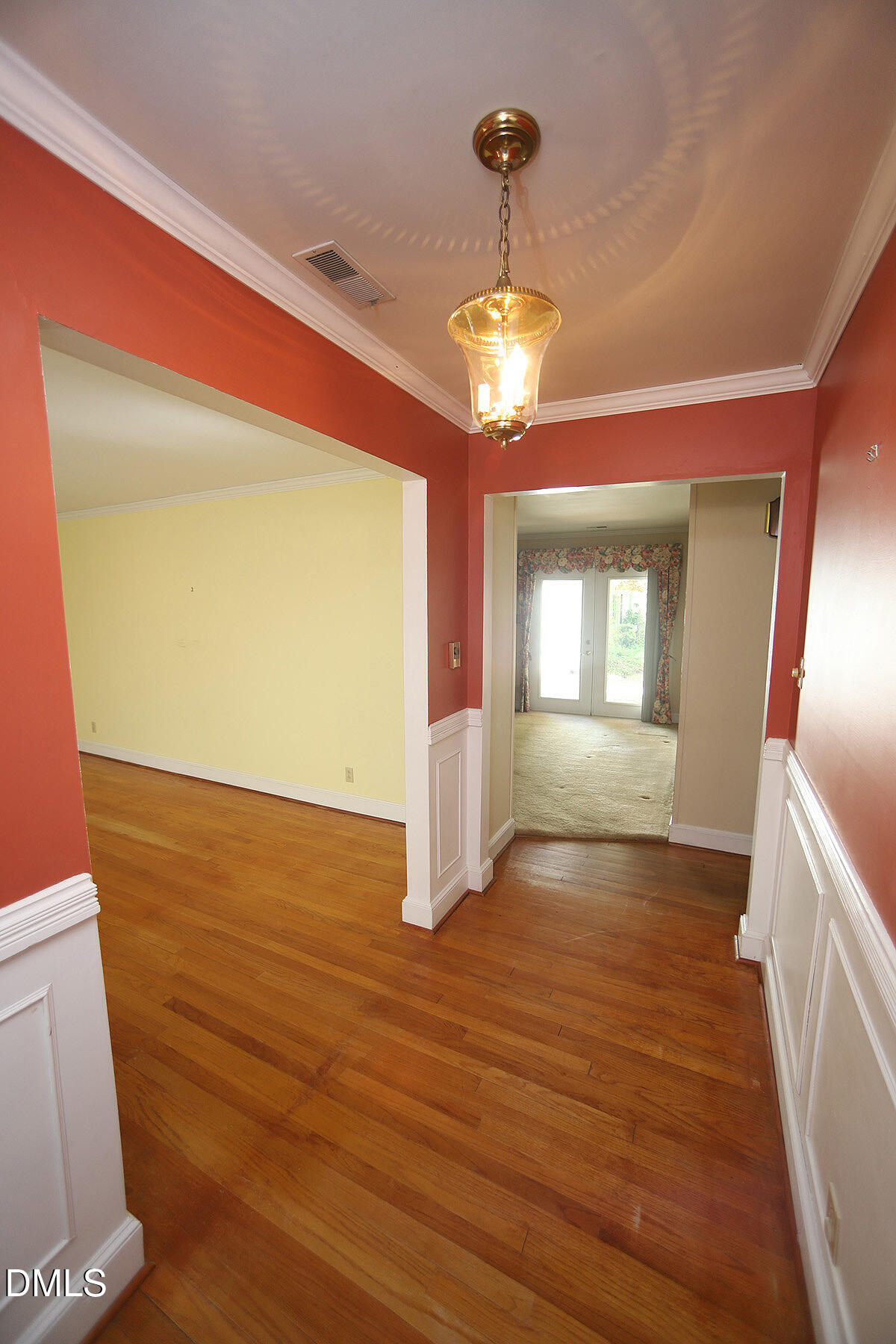 3518 Randolph Road Durham, NC 27705 - Photo 13 of 32 a view of an empty room with wooden floor and a window