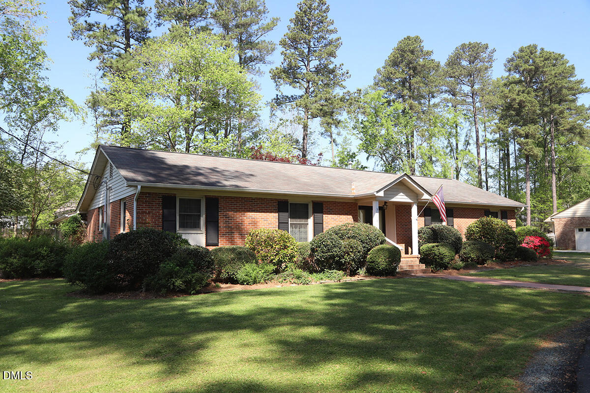 3518 Randolph Road Durham, NC 27705 - Photo 2 of 32 a front view of a house with garden