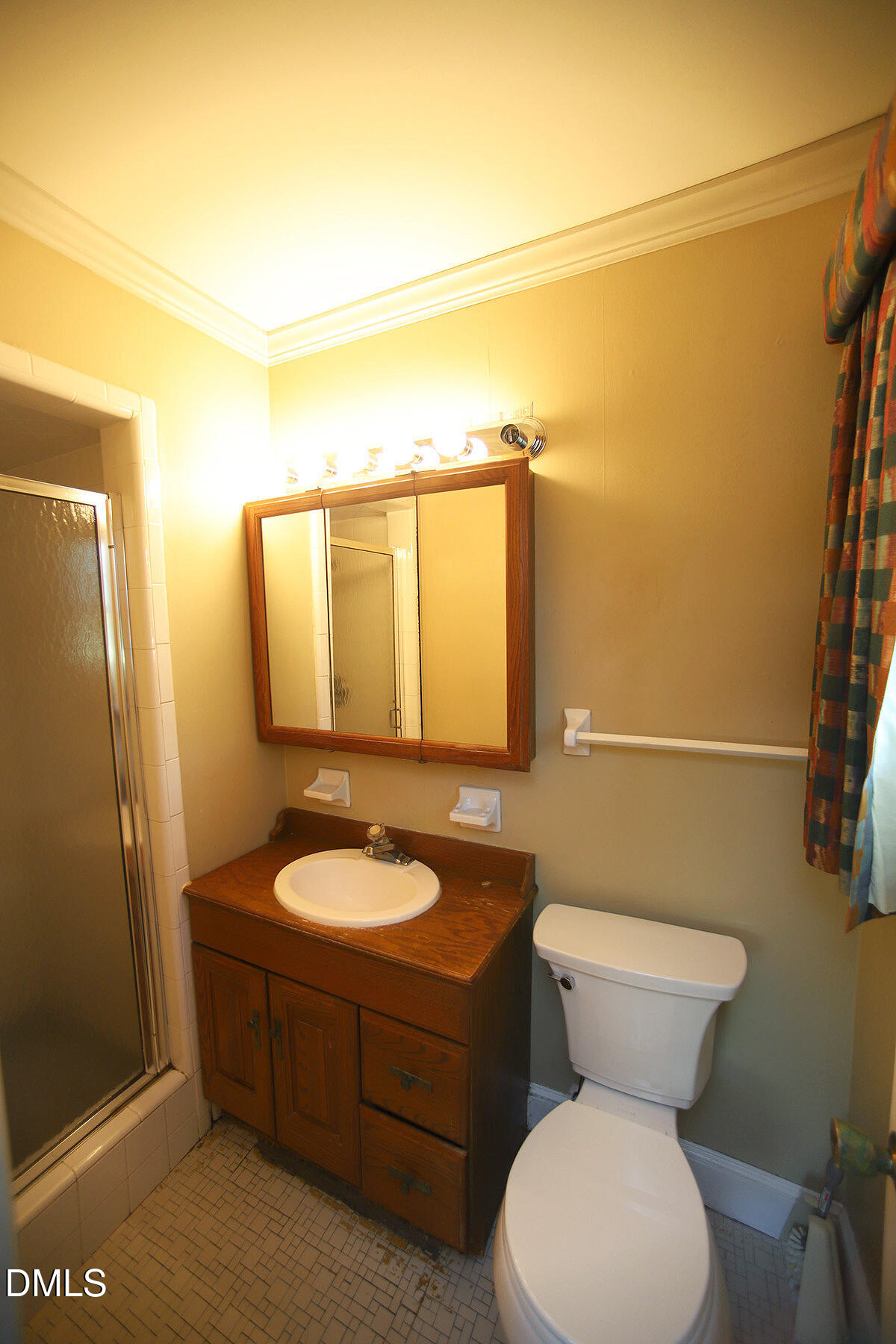 3518 Randolph Road Durham, NC 27705 - Photo 26 of 32 a bathroom with a toilet sink and mirror