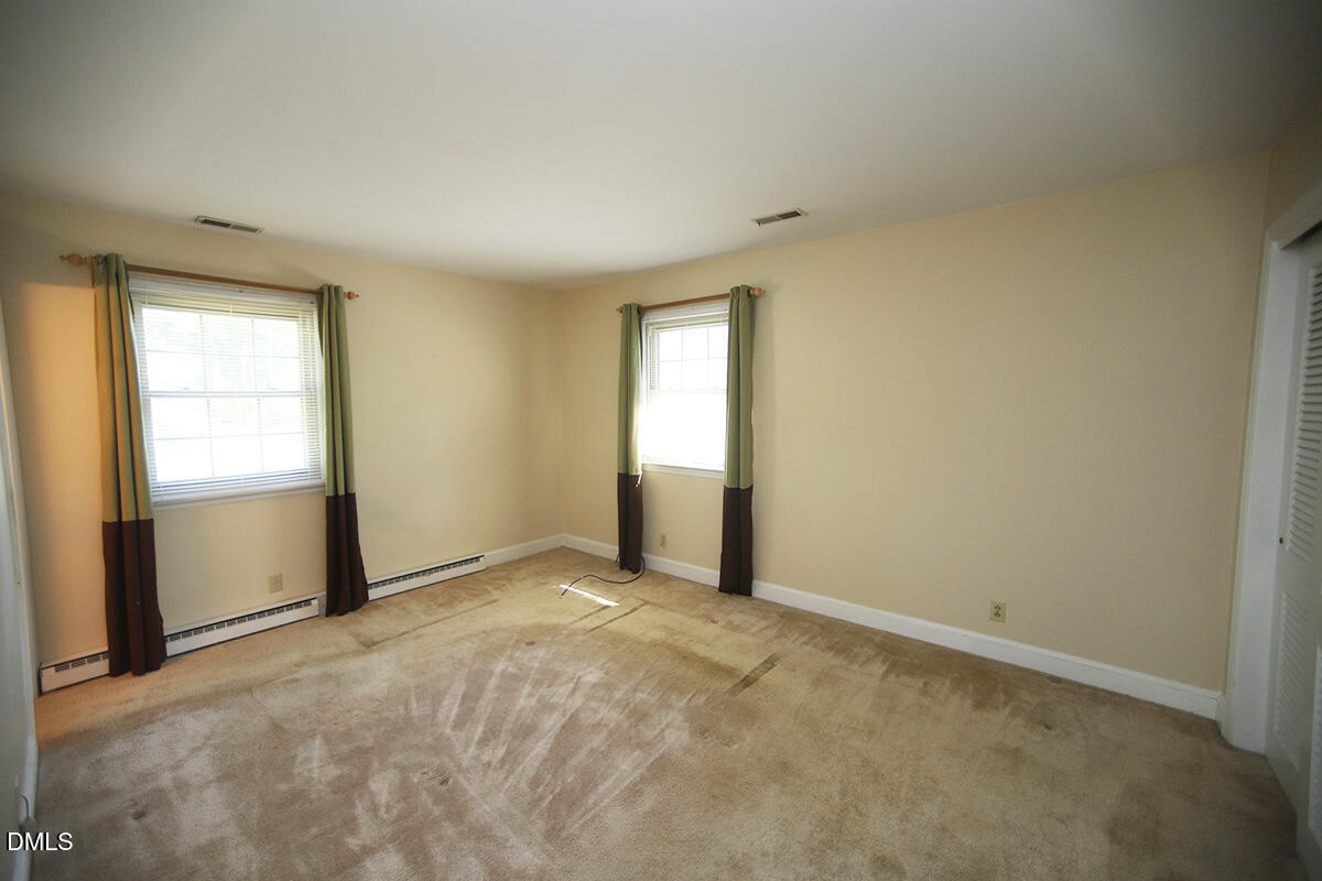 3518 Randolph Road Durham, NC 27705 - Photo 32 of 32 an empty room with windows