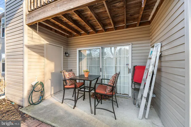 a view of a two chairs in the balcony
