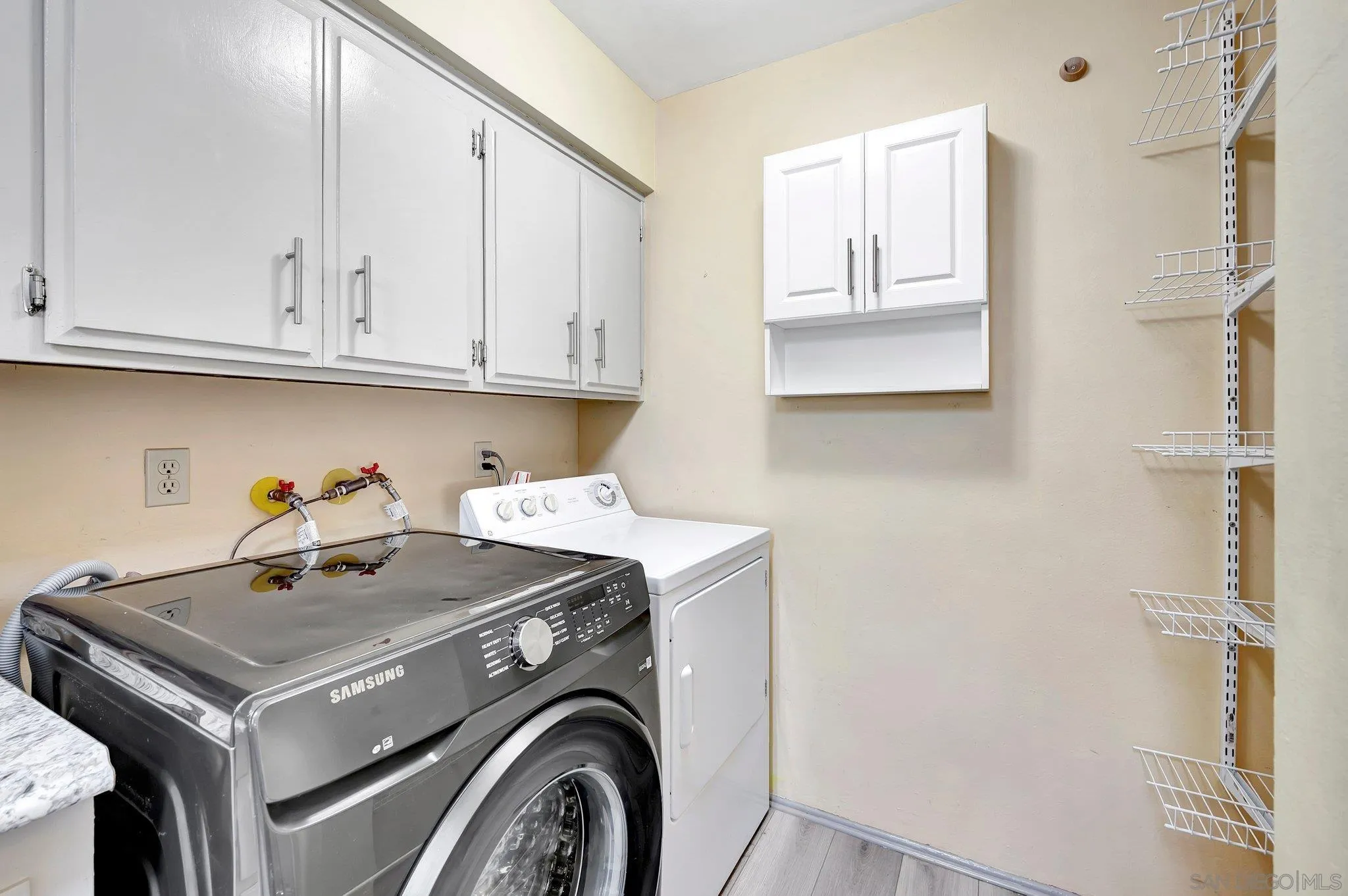 14247 Anabelle Drive Poway, CA 92064 - Photo 12 of 33 a utility room with dryer and washer