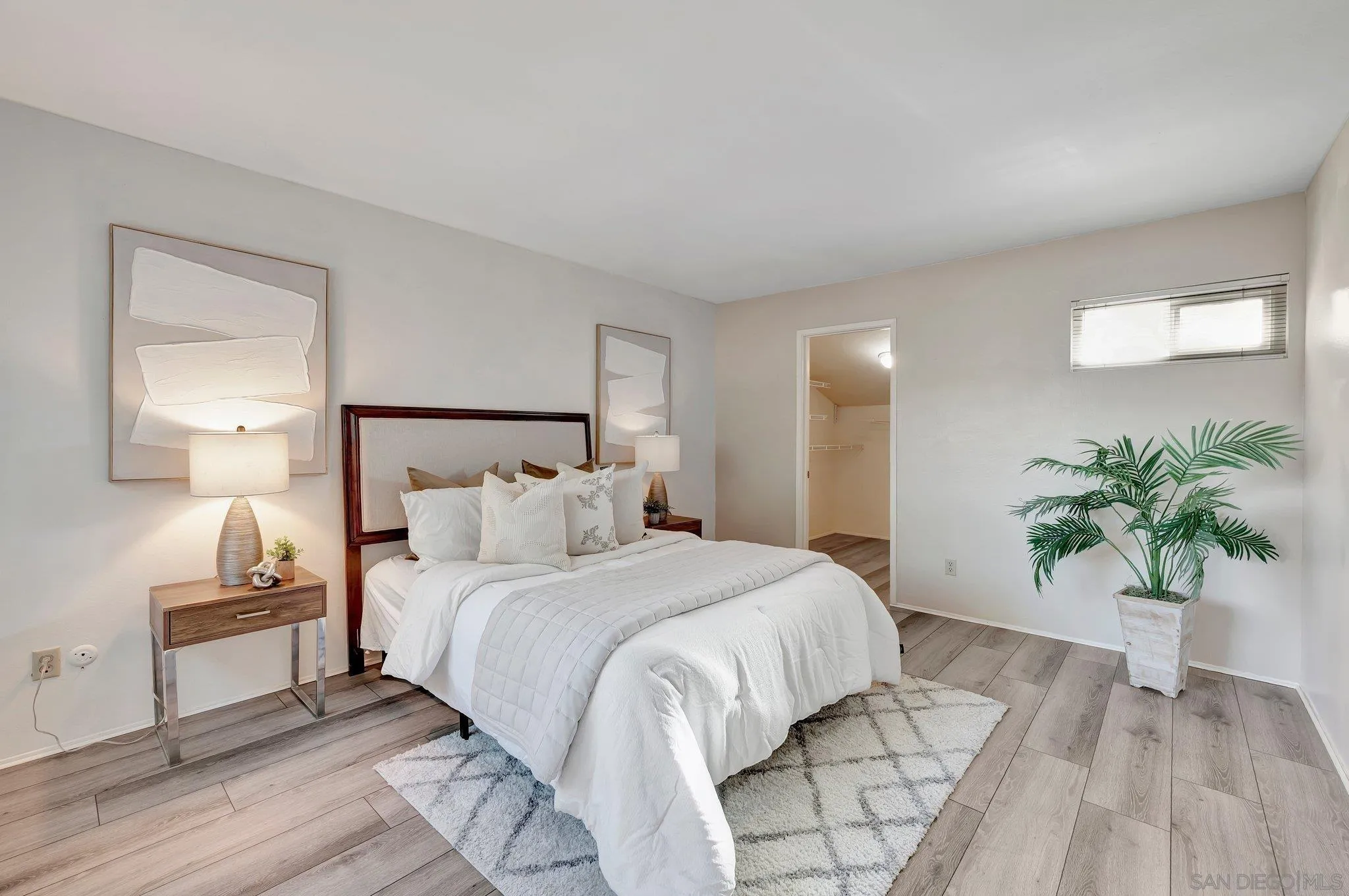 14247 Anabelle Drive Poway, CA 92064 - Photo 15 of 33 a bedroom with a large bed and a potted plant