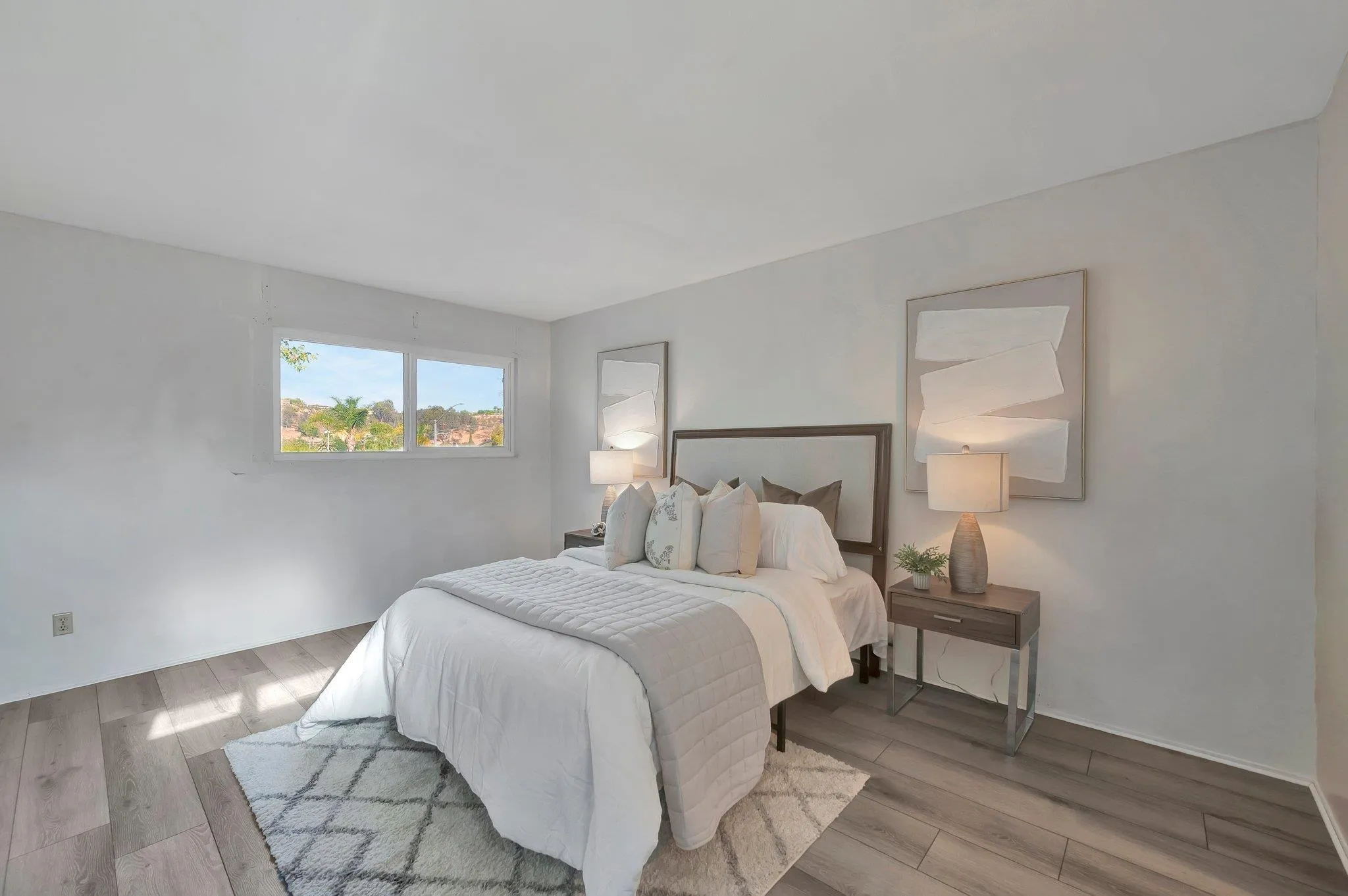 14247 Anabelle Drive Poway, CA 92064 - Photo 16 of 33 a bedroom with a bed and a lamp on table