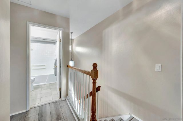 a view of a hallway with a white walls