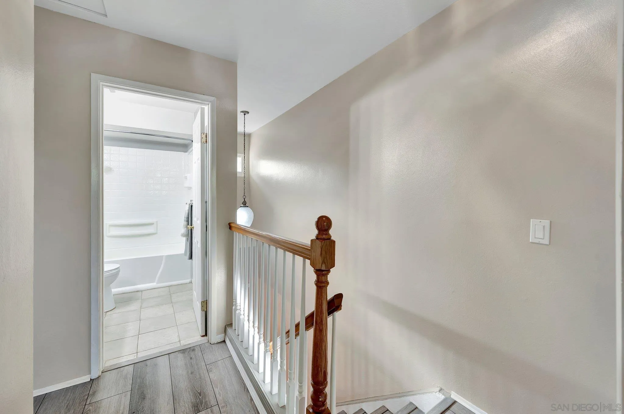 14247 Anabelle Drive Poway, CA 92064 - Photo 20 of 33 a view of a hallway with a white walls