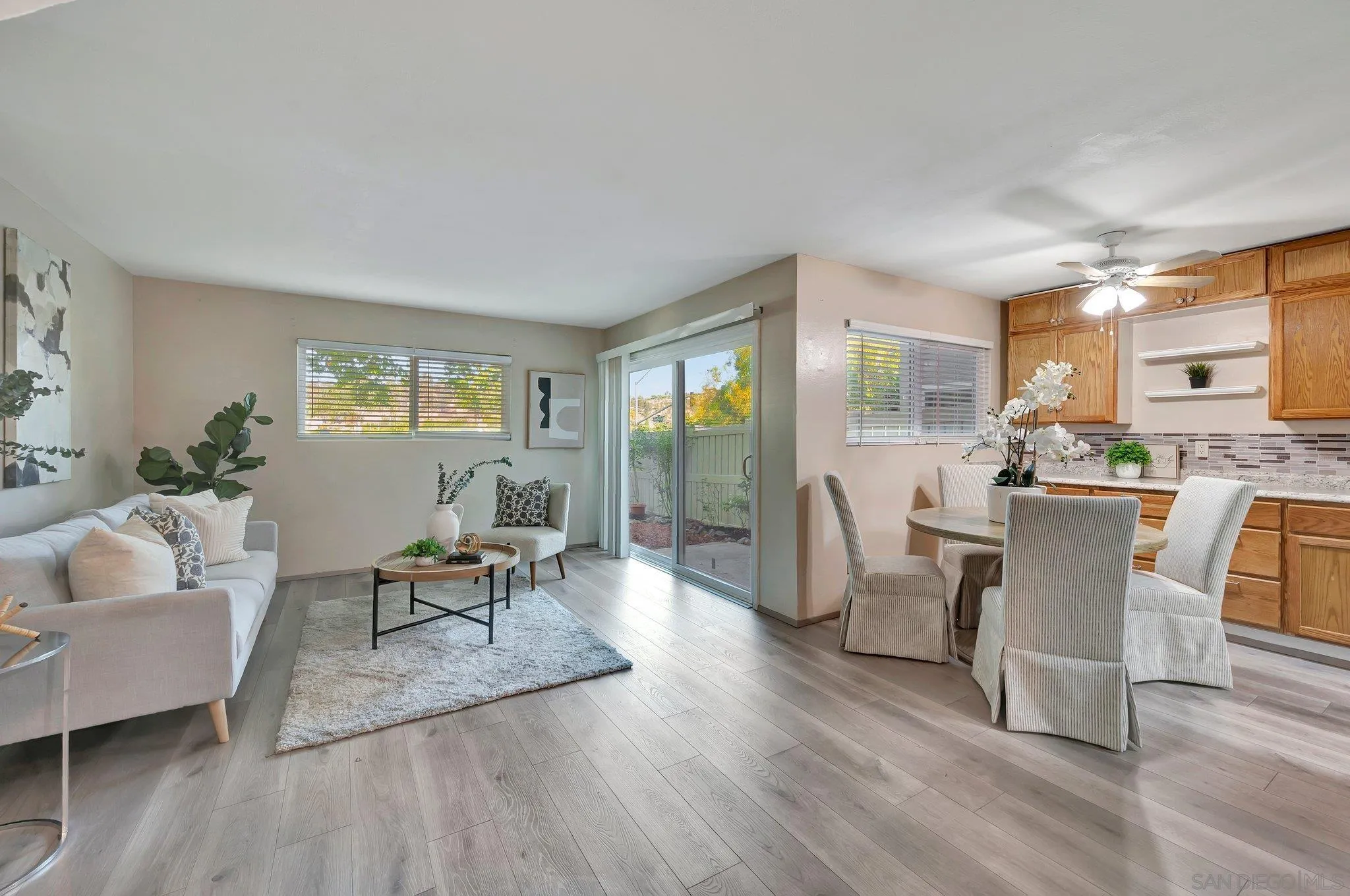 14247 Anabelle Drive Poway, CA 92064 - Photo 2 of 33 a living room with furniture a wooden floor and a large window