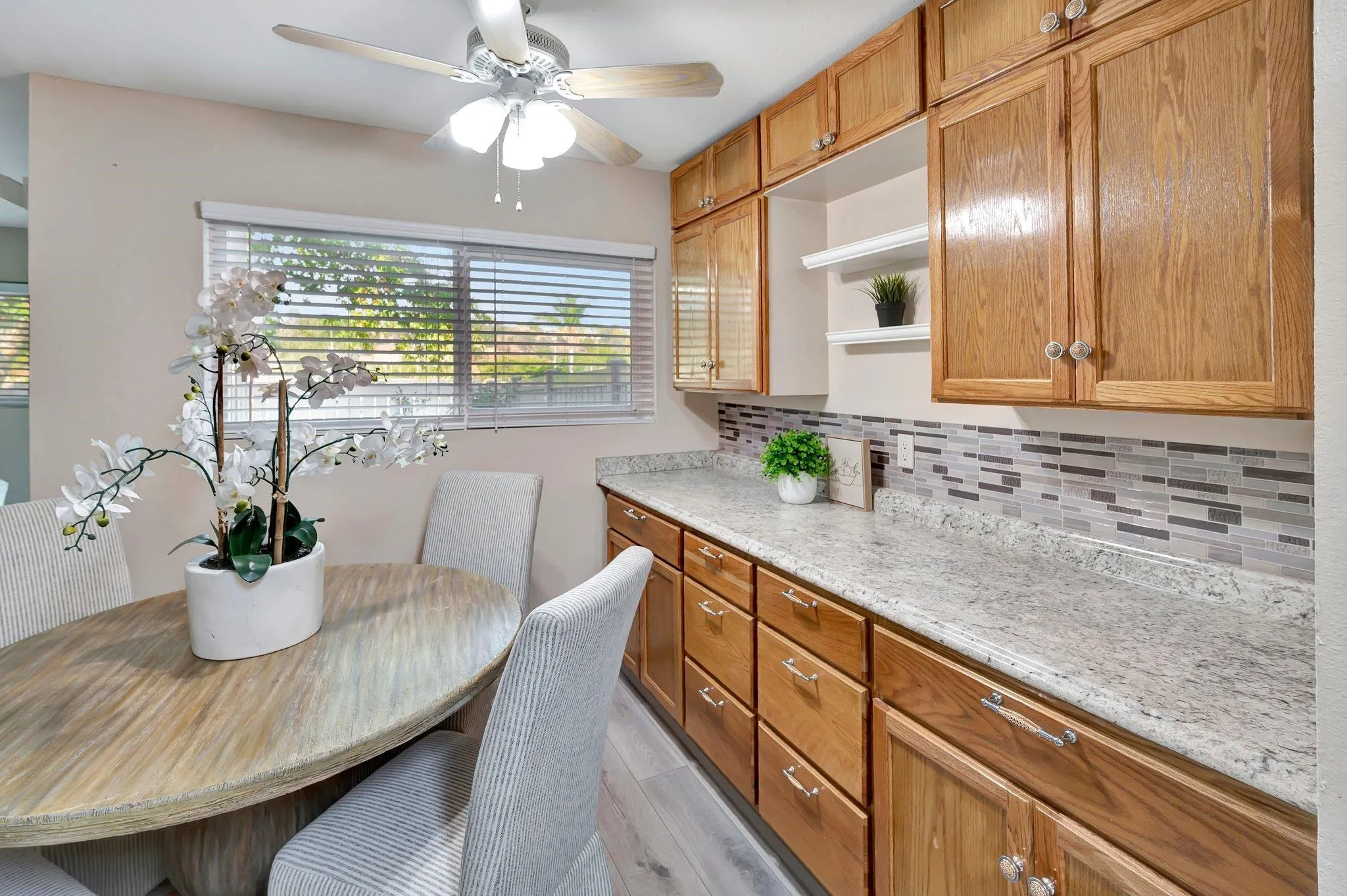 14247 Anabelle Drive Poway, CA 92064 - Photo 9 of 33 a kitchen with a table and chairs in it