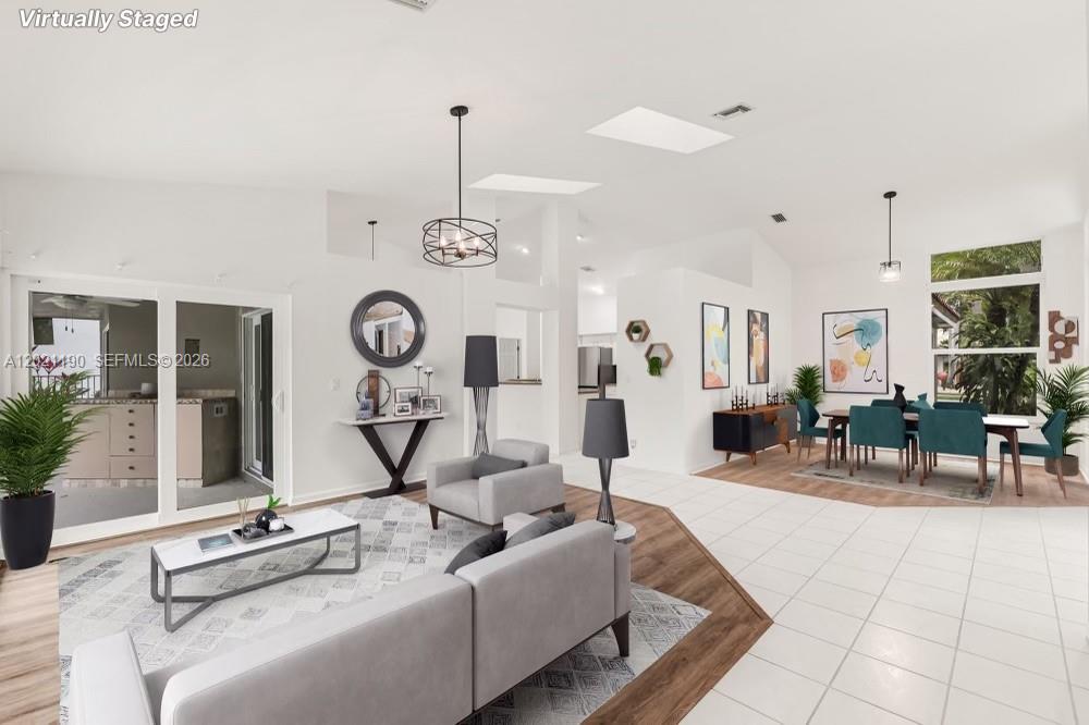 814 Heron Road Weston, FL 33326 - Photo 10 of 27 a living room with furniture and wooden floor