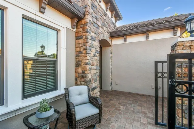 a large kitchen with stainless steel appliances granite countertop a lot of counter space and wooden floors