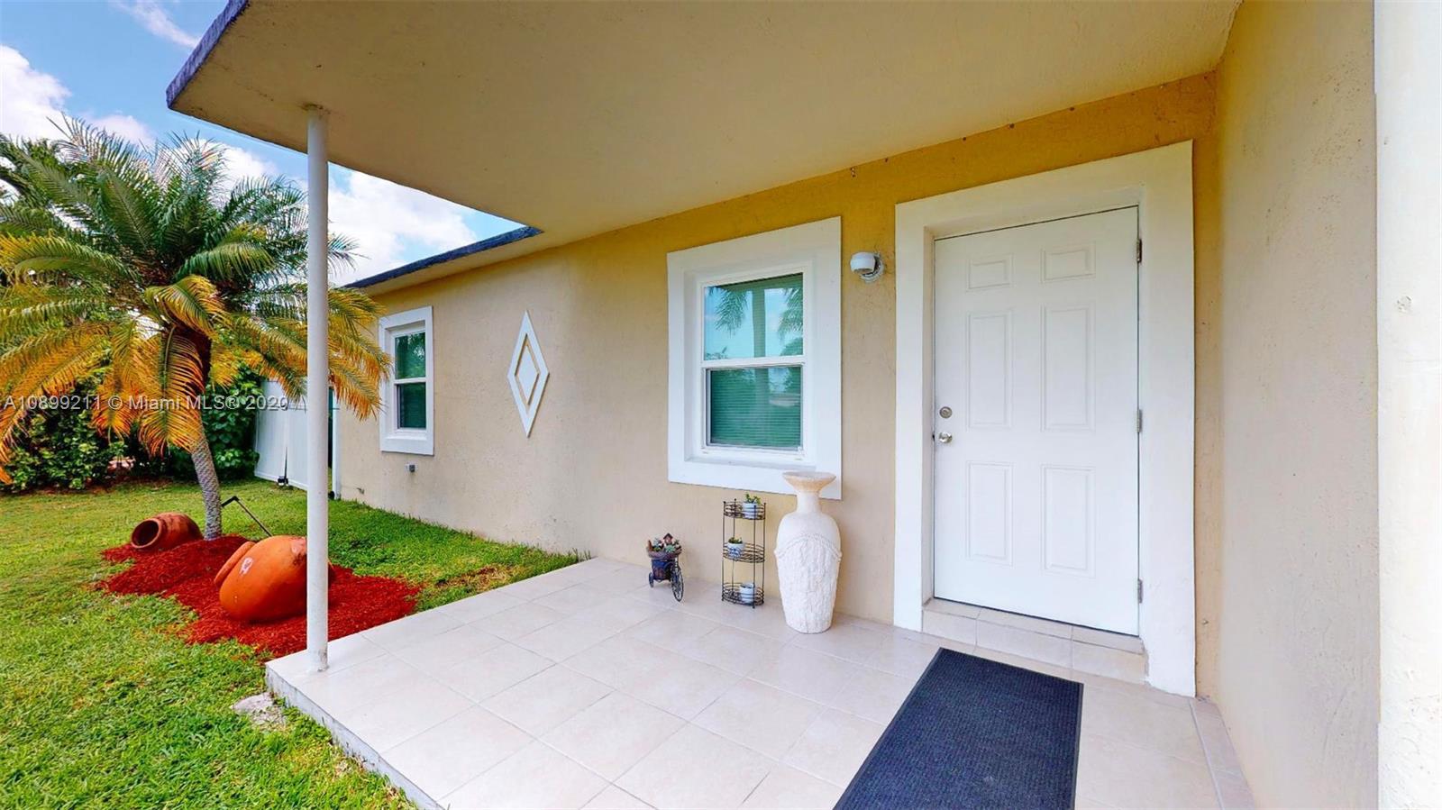 29120 Kansas Road Homestead, FL 33033 - Photo 3 of 24 a view of a house with backyard and sitting area