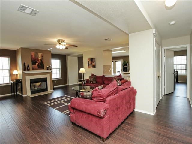 1008 Apollo Circle Round Rock, TX 78664 - Photo 11 of 33 a living room with furniture and a fireplace