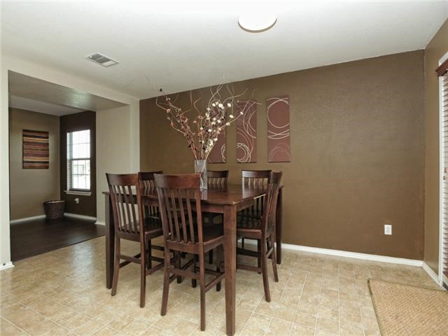 1008 Apollo Circle Round Rock, TX 78664 - Photo 13 of 33 a view of a dining room with furniture