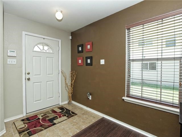1008 Apollo Circle Round Rock, TX 78664 - Photo 4 of 33 a view of a livingroom with wooden floor and a window