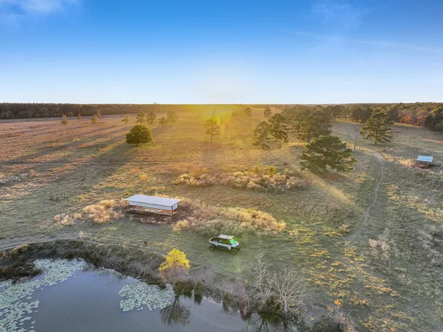 a view of lake with green space