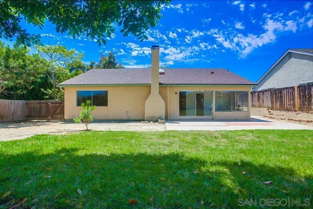 7114 Columbine Drive Carlsbad, CA 92011 - Photo 16 of 16 a house view with a seating space and garden