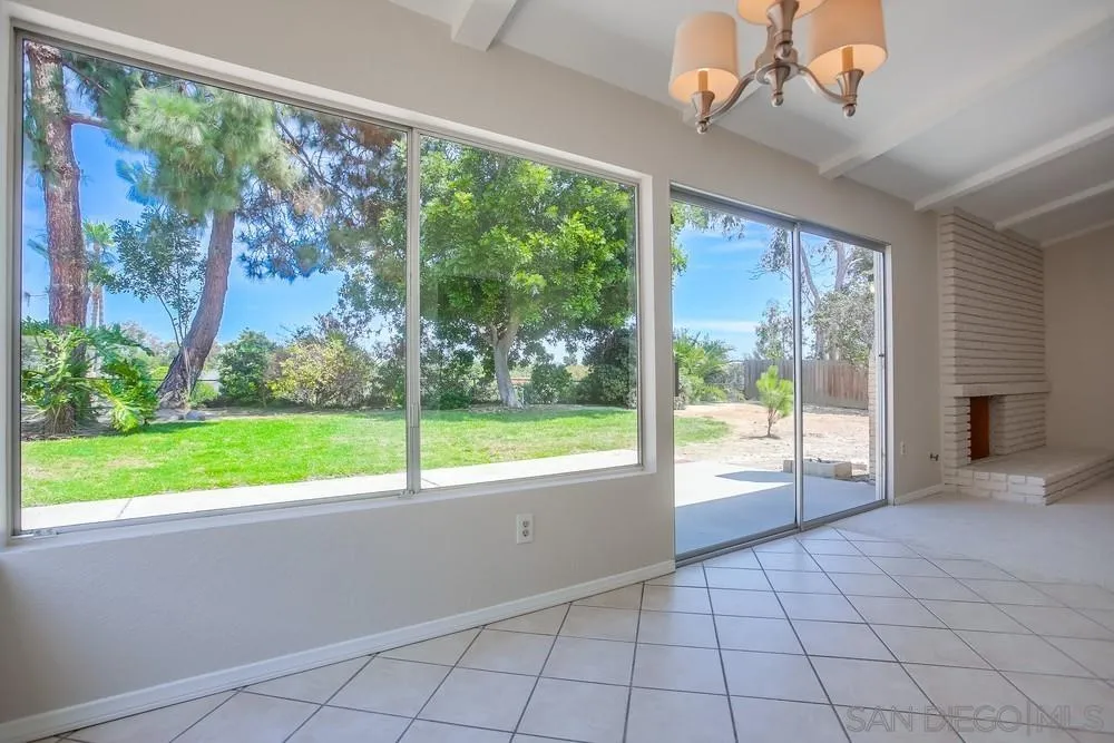 7114 Columbine Drive Carlsbad, CA 92011 - Photo 9 of 16 a view of an empty room with a large window