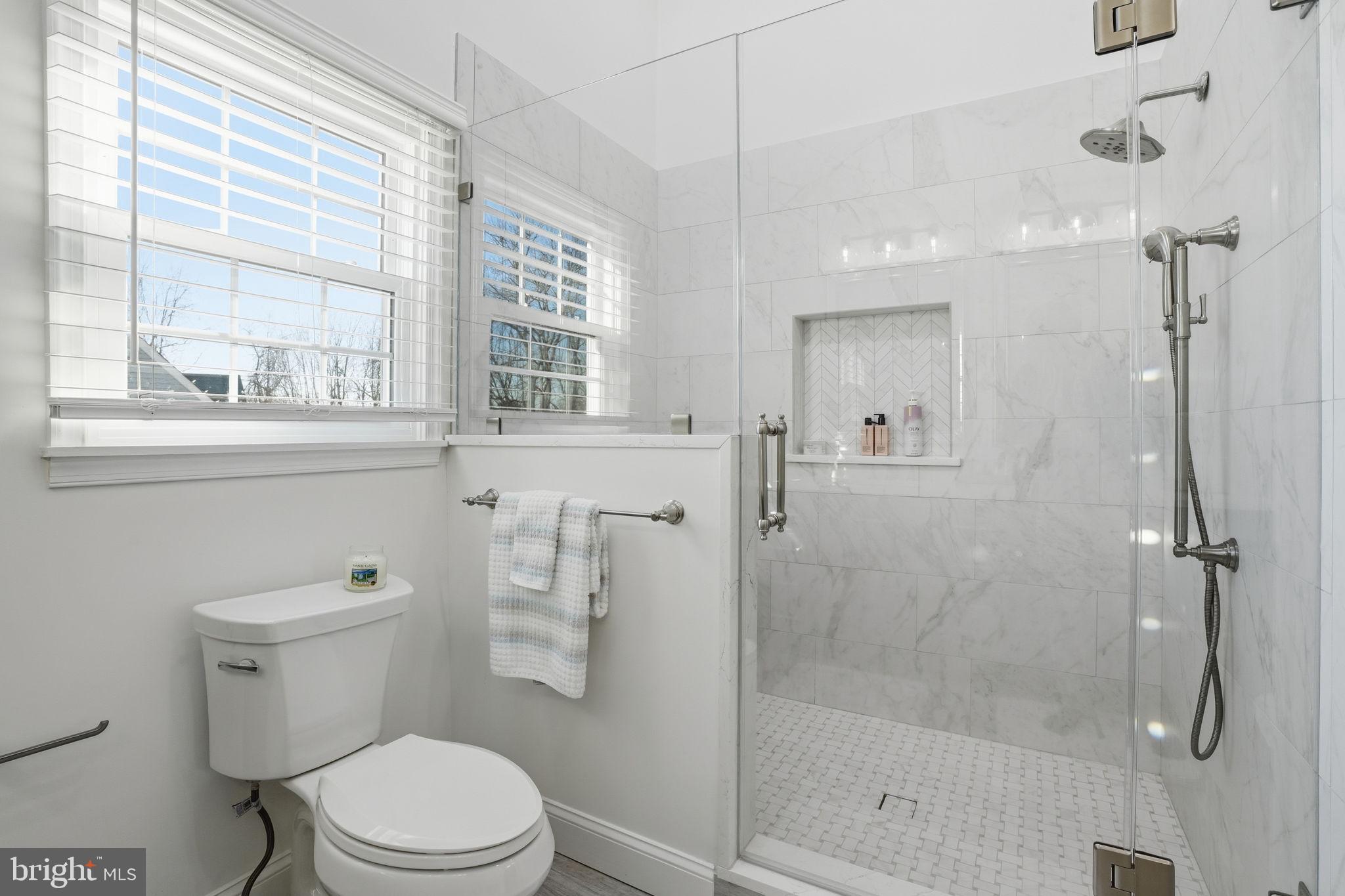 3 Swallow Road Holland, PA 18966 - Photo 23 of 45 a bathroom with a shower a toilet and a sink