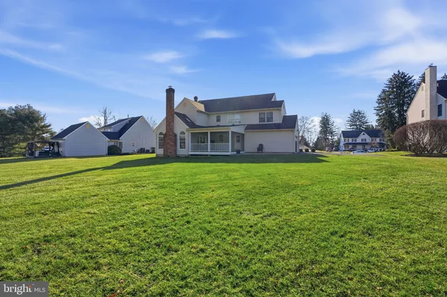 a view of a house with a big yard