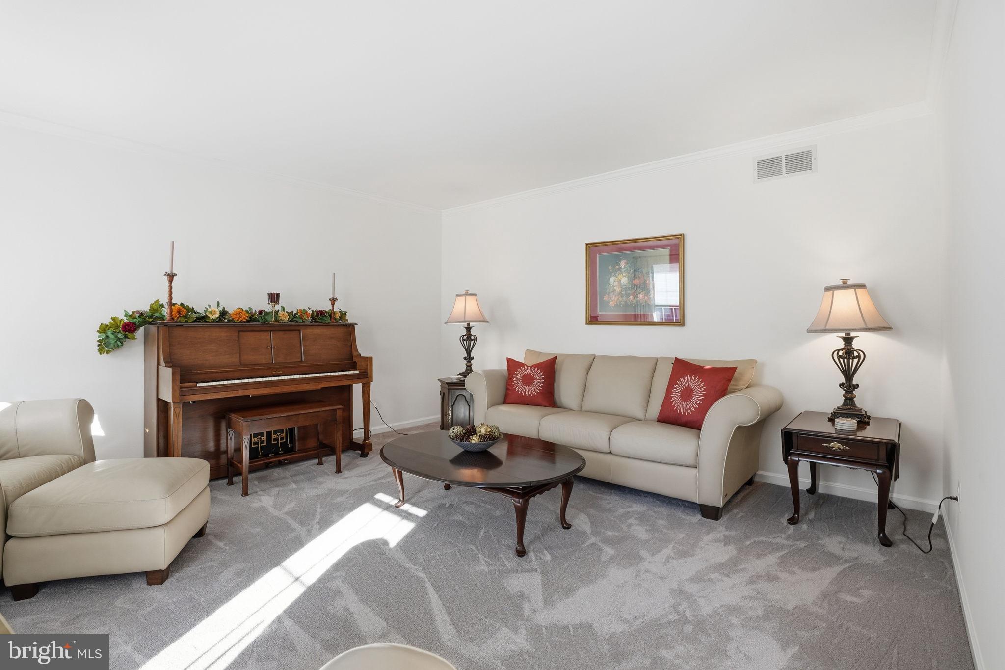 3 Swallow Road Holland, PA 18966 - Photo 6 of 45 a living room with furniture a piano and a lamp