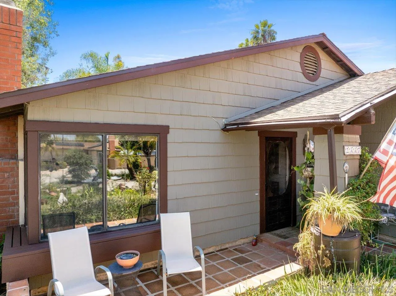 2337 Fallingleaf Road Oceanside, CA 92056 - Photo 29 of 34 a patio with table and chairs and potted plants
