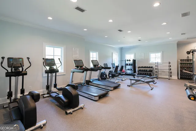 a view of a lake with a house in the background