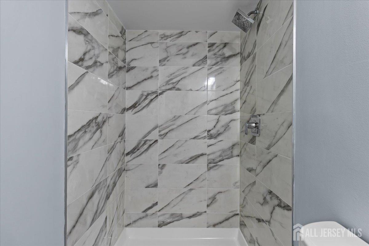 104 Maple Place Keyport, NJ 07735 - Photo 40 of 67 a bathroom with a bathtub