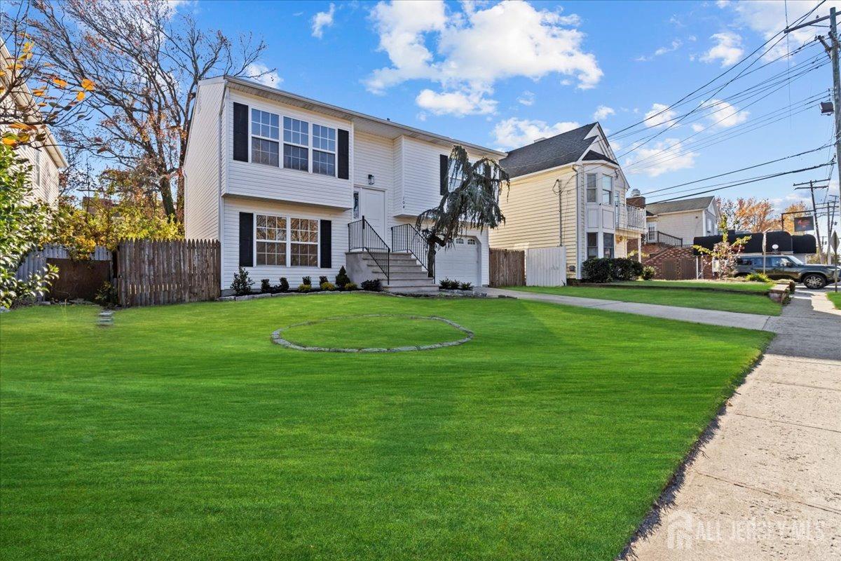 104 Maple Place Keyport, NJ 07735 - Photo 4 of 67 a view of a house with a yard and sitting area