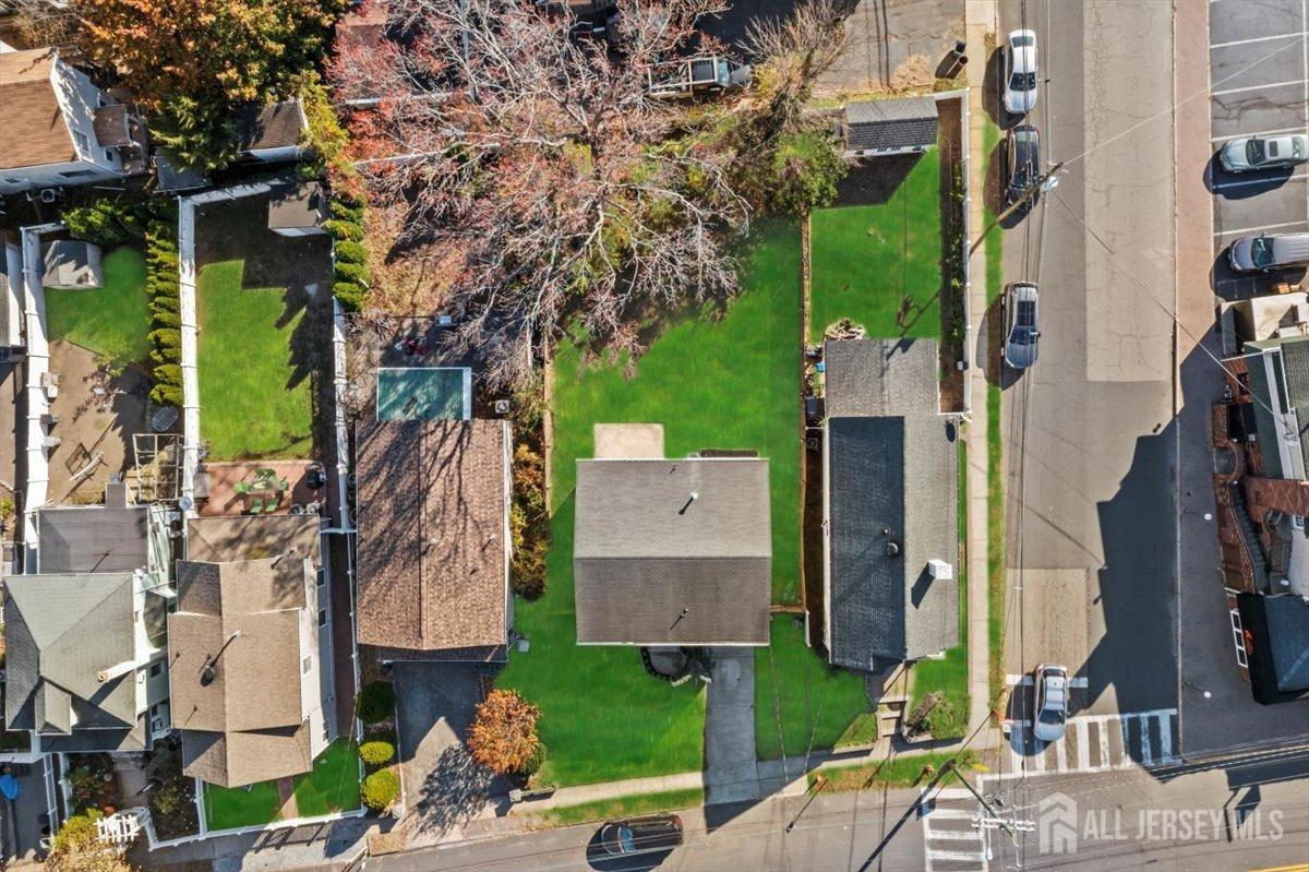104 Maple Place Keyport, NJ 07735 - Photo 46 of 67 an aerial view of multiple houses with yard