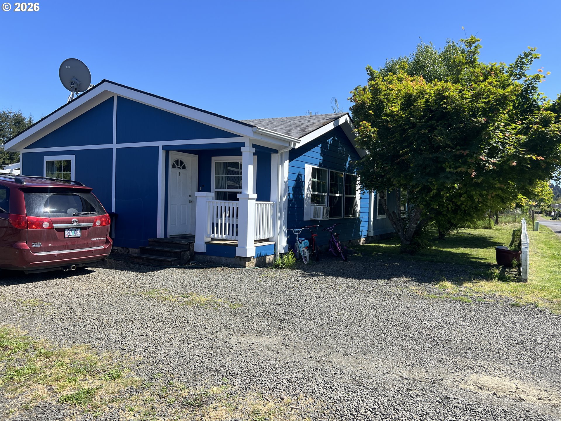 210 Northwest Grinstead Street Siletz, OR 97380 - Photo 1 of 29 a house view with a garden space