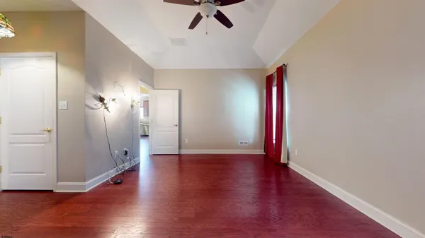 a view of a livingroom with wooden floor